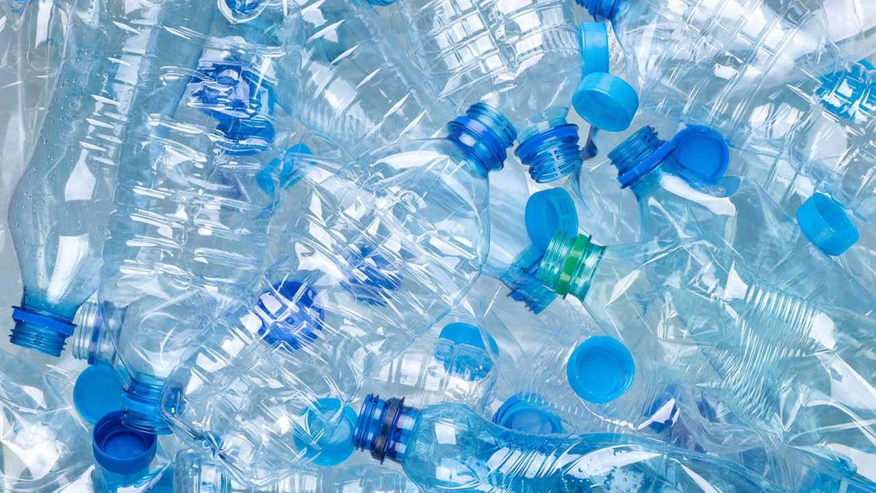 Sorted blue PET bottles suitable for recycling applications.