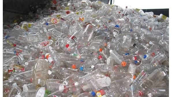 Sorted transparent PET bottles suitable for recycling and further processing.